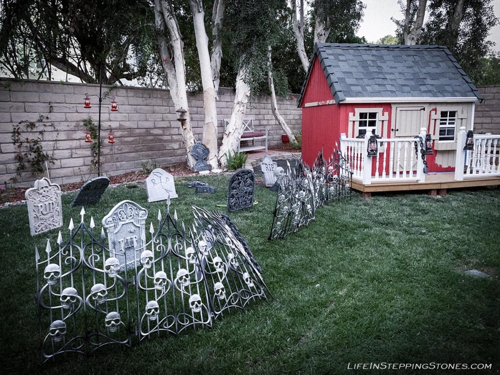 Backyard Halloween decorations with cemetery