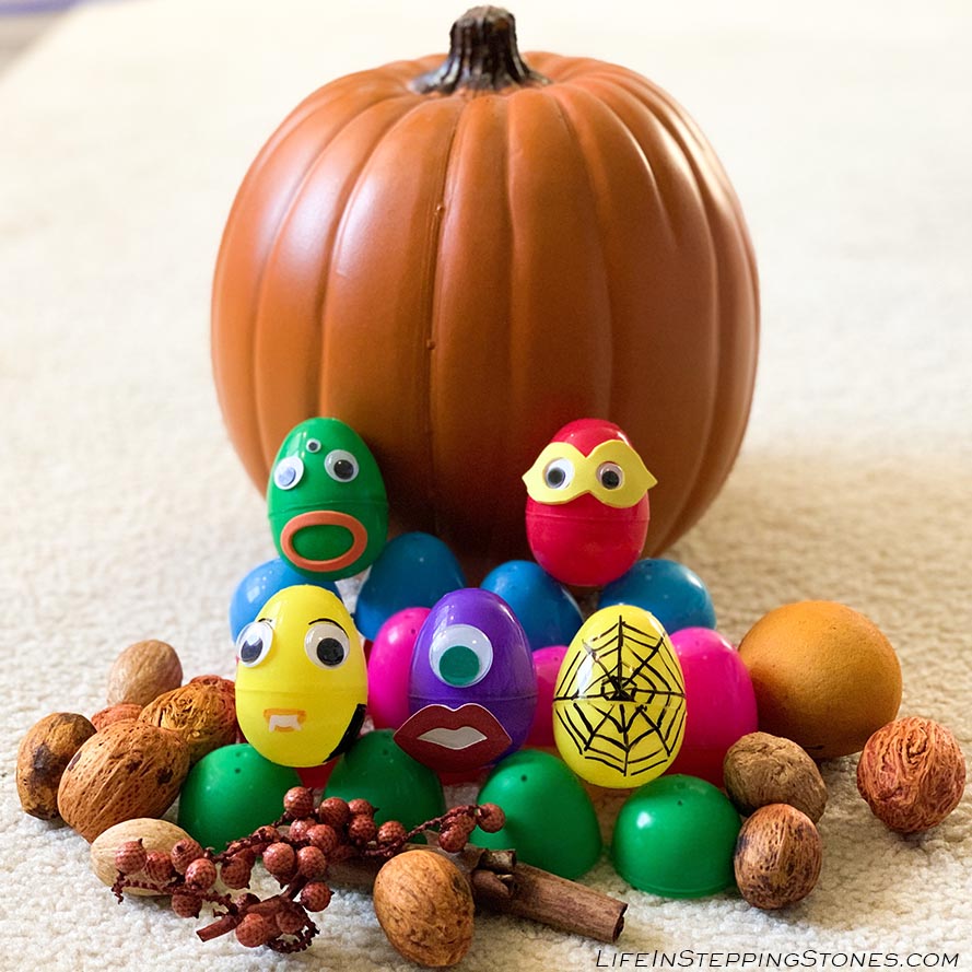 Halloween DIY Candy Egg Hunt with vampire, monster, superhero, and spiderweb eggs.