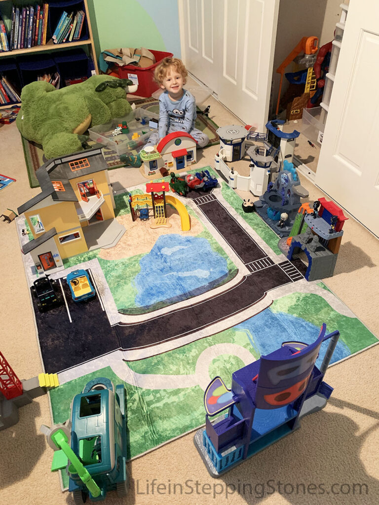 Small Town play rug for child's bedroom, nursery, or playroom with wide roads for large cars including Playmobil, Lego, PJ Masks, Paw Patrol, Calico Critters, and Little People