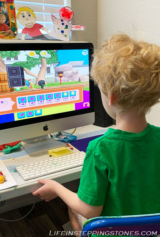 positive screen time for kids - Child playing CodeSpark The Foos and learning basic coding skills. CodeSpark is an educational apps. Teach your child to code. Is it really too much screen time if your child is learning new skills?