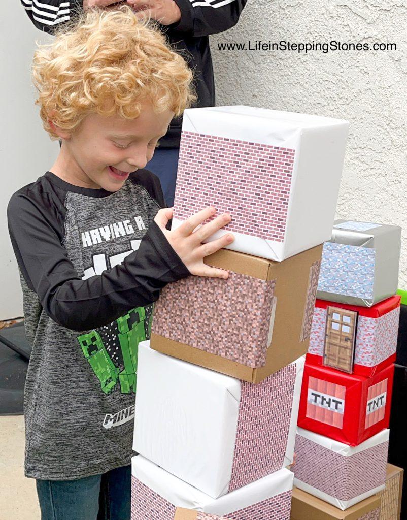 Minecraft birthday party activity. Building a tower with Minecraft boxes.