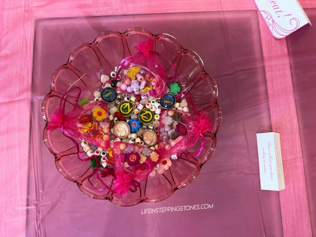 Glinda's necklace making station for Wicked birthday party activity