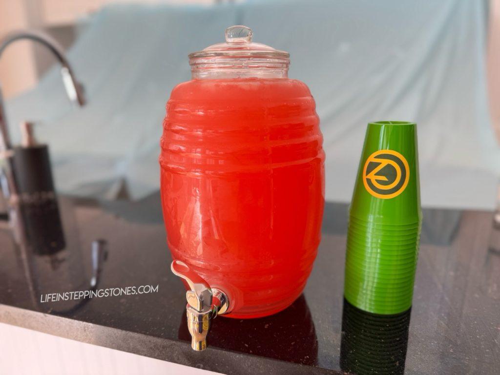 Wicked birthday party drink idea: pink grapefruit juice and customize green cups with Oz logo